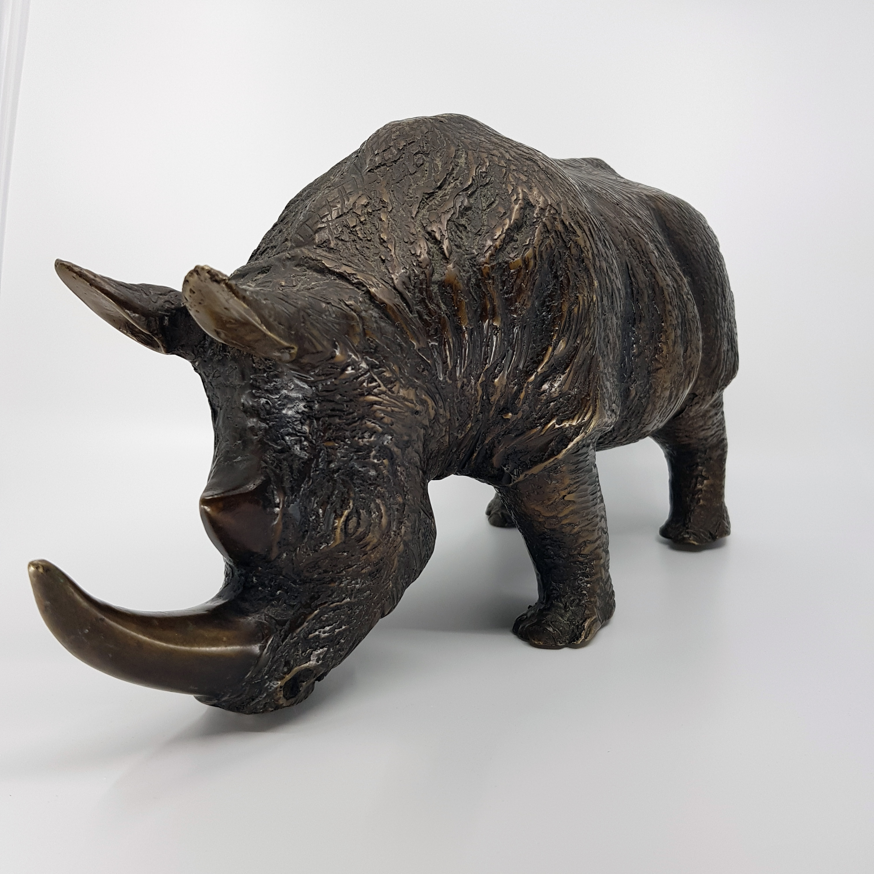 Impressive bronze rhinoceros sculpture